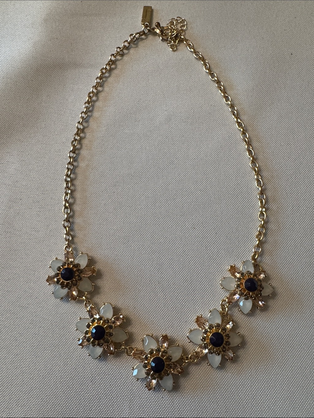 The Limited Gold Floral Necklace with White Petals and Black and Pink Centers